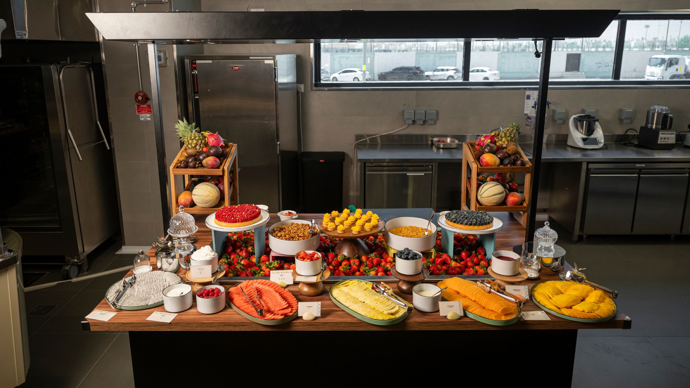 Curated dessert buffet display at Leylaty Events Riyadh catering kitchen
